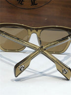 Brown square sunglasses with gold fleur-de-lis detail on temple arms, stylish frame design