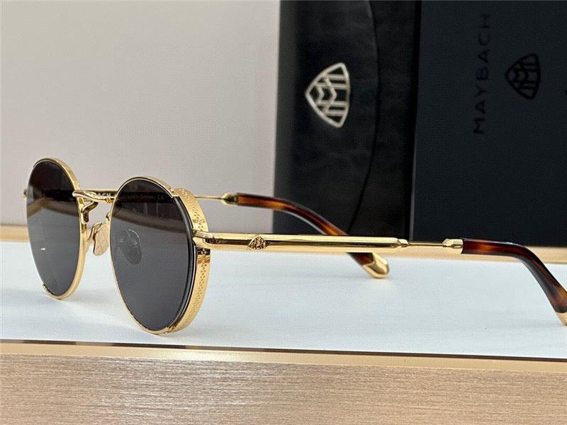 Luxury round sunglasses with gold metal frame, dark lenses, and tortoiseshell arms on display