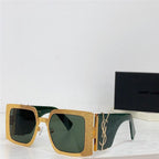 Square oversized sunglasses with gold textured frames, green lenses, and YSL logo detail