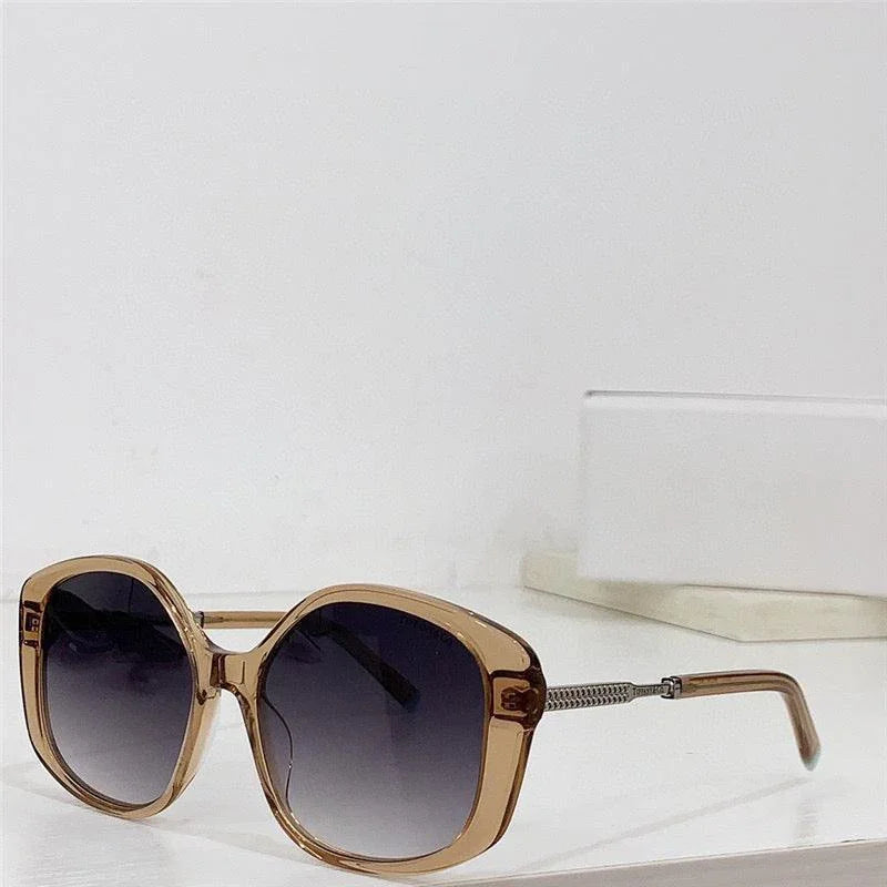 Oversized brown square sunglasses with gradient lenses on white background