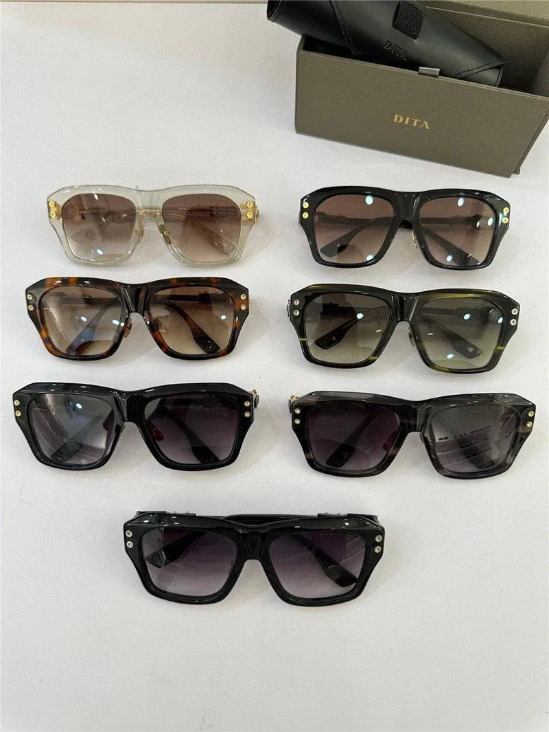 Assorted oversized square sunglasses with gradient lenses and bold frames on a white background