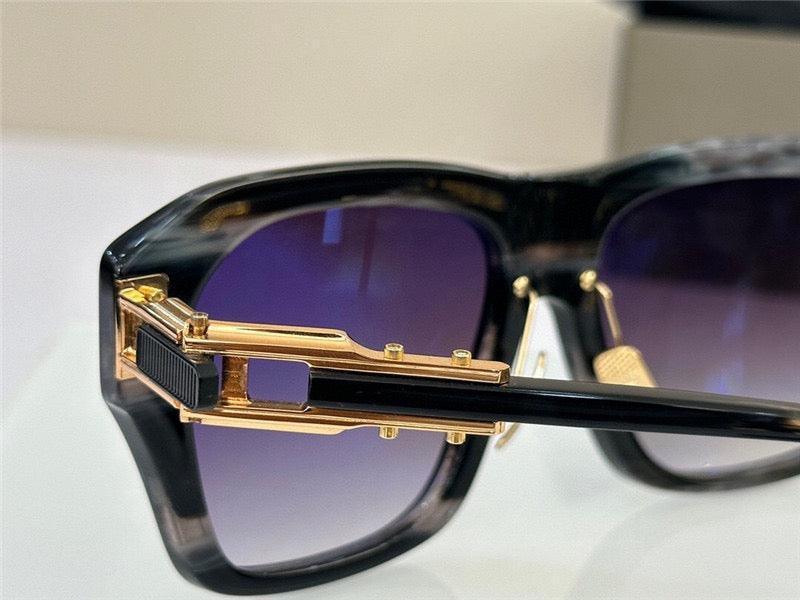 Close-up of luxury black sunglasses with gold accents and gradient purple lenses