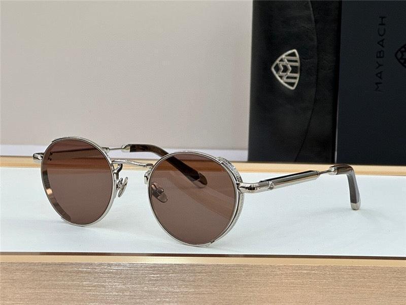 Round brown lens sunglasses with silver metal frame on display with branded case in background
