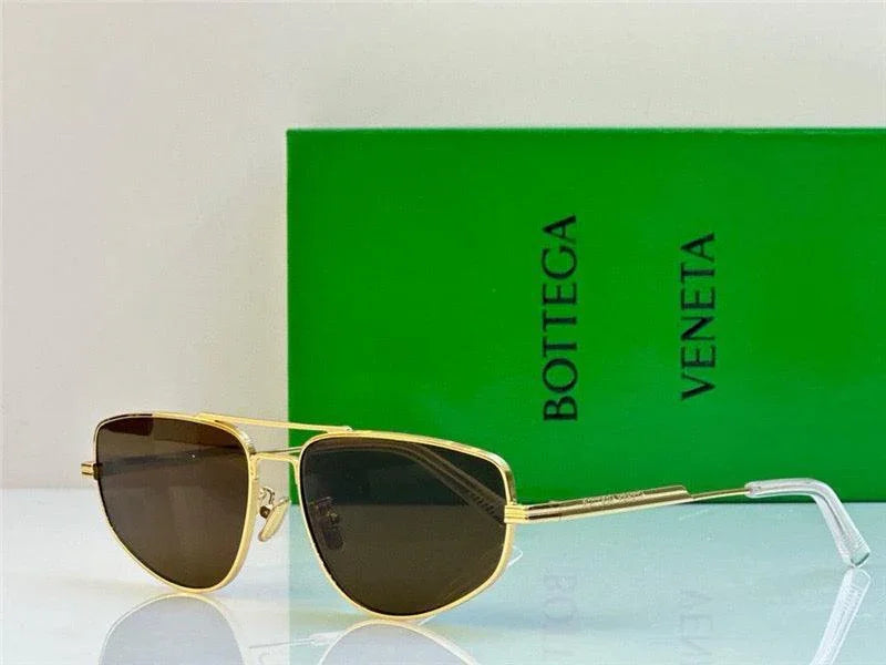 Gold frame sunglasses with dark lenses, stylish aviator design, green Bottega Veneta box