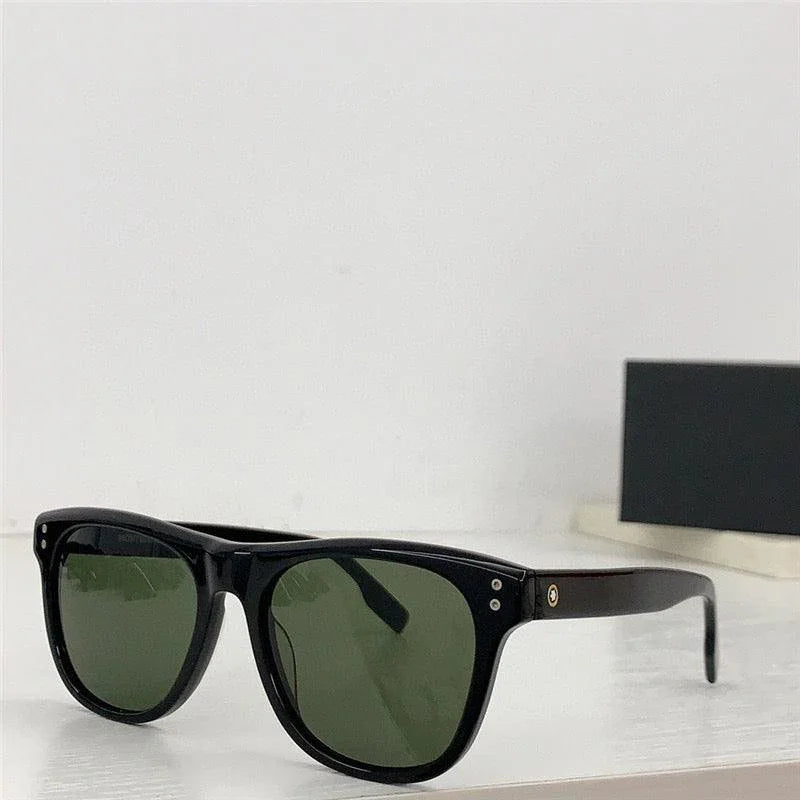 Classic black sunglasses with green polarized lenses on a white surface