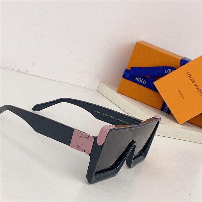 Black oversized square sunglasses with pink accents, UV protection, on white surface