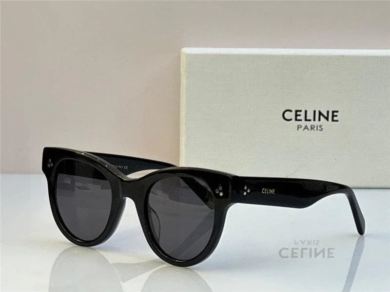 Black round Celine sunglasses with dark lenses, stylish designer eyewear on display