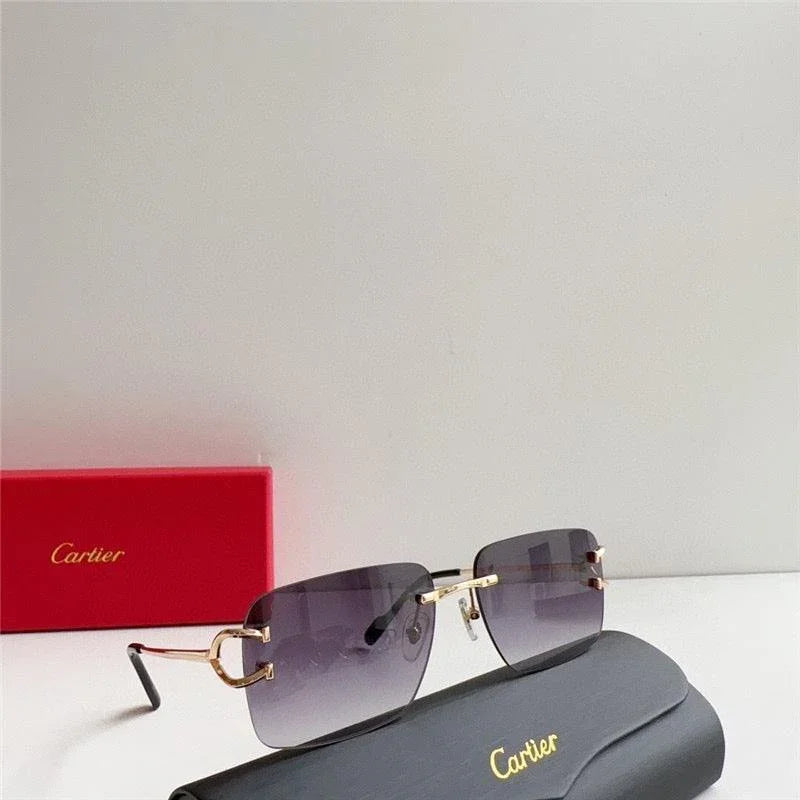 Gold-rimmed gradient sunglasses with luxury branding, grey case, and red box display.