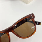Tortoiseshell frame sunglasses with brown polarized lenses and visible Montblanc logo