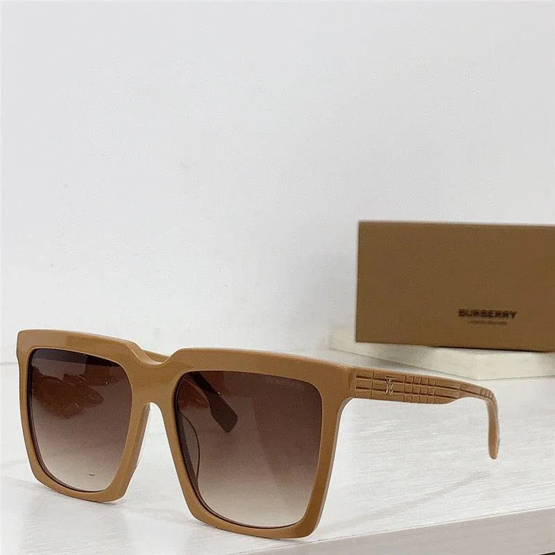 Square oversized brown sunglasses with gradient lenses on a white surface