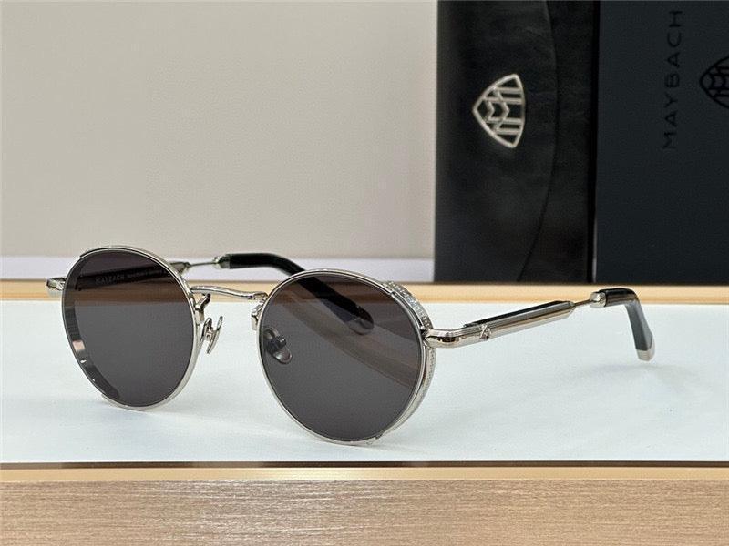 Round black sunglasses with silver metal frame on display, luxury eyewear accessories.
