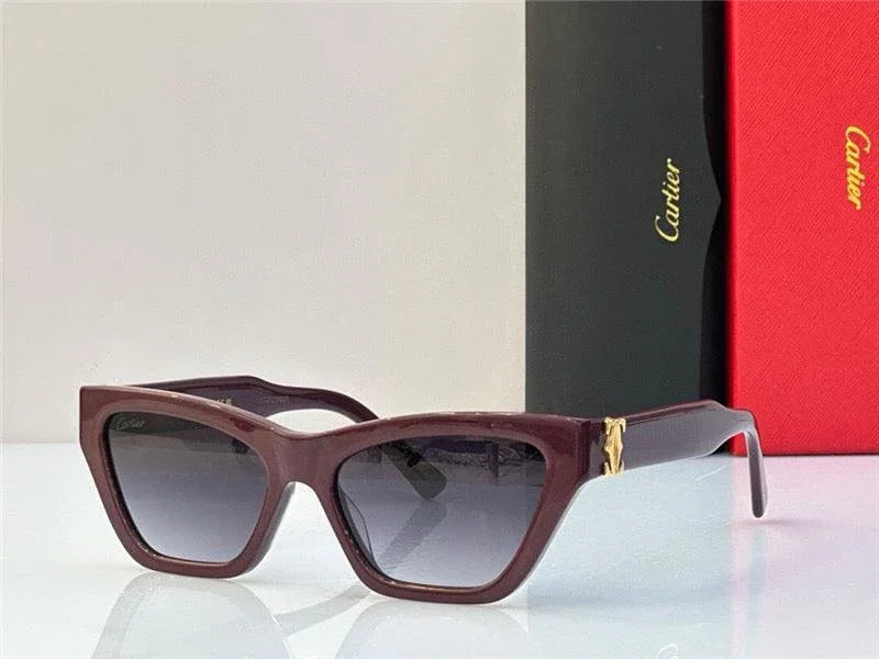 Square cat-eye sunglasses with brown frames and gradient lenses, displayed with luxury packaging