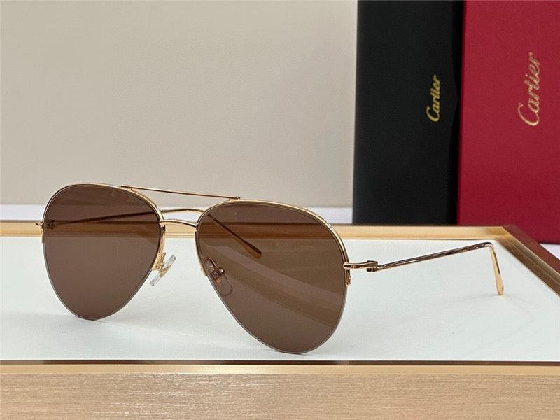 Gold metal aviator sunglasses with brown polarized lenses on display tray