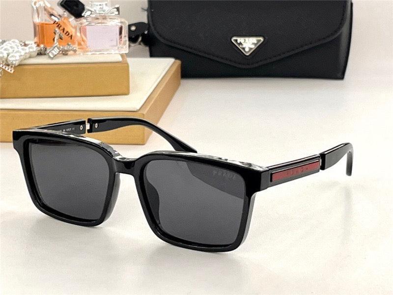 Black square-frame sunglasses with dark polarized lenses and thick arms, displayed on a white surface.