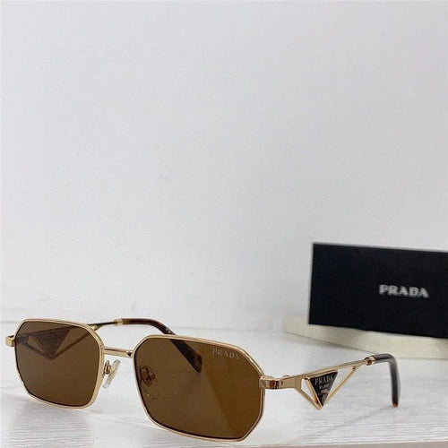Geometric brown sunglasses with gold frame and dark lenses, luxury eyewear on white surface
