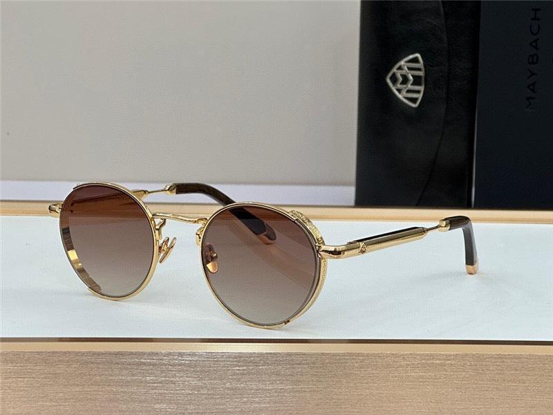 Round gold frame sunglasses with brown gradient lenses on display, luxury accessories case in background