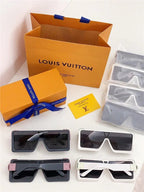 Luxury designer sunglasses with bold frames, Louis Vuitton packaging and accessories included.
