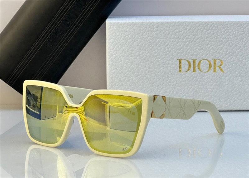 Square oversized sunglasses with yellow lenses and white frame, Dior logo packaging behind