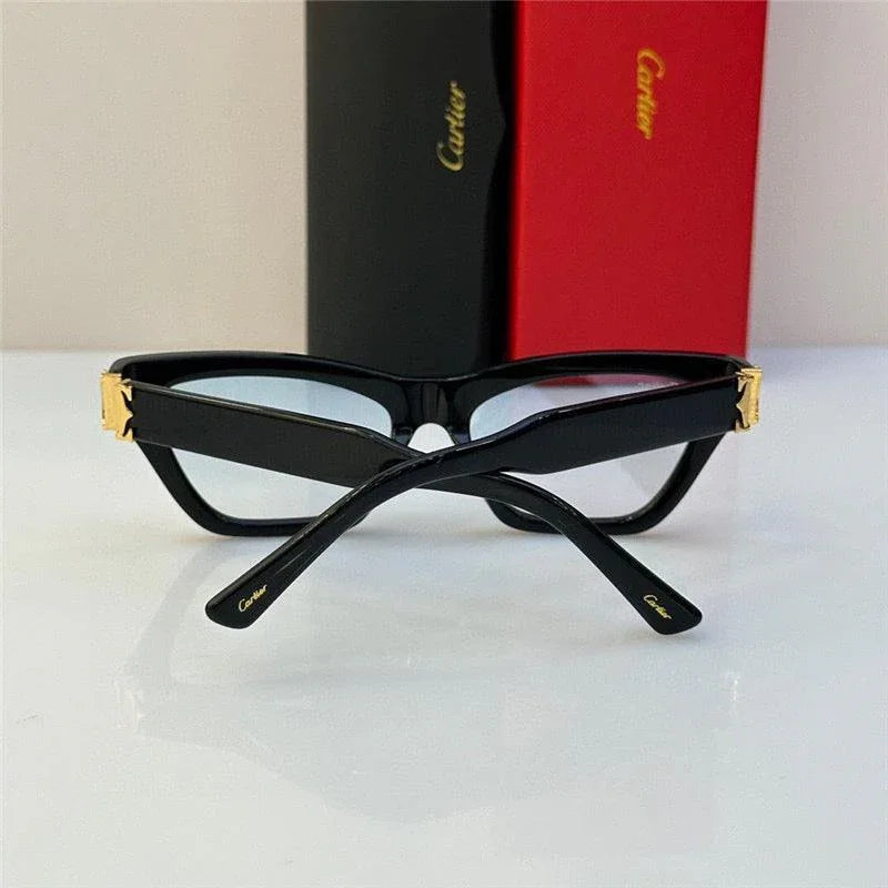 Black cat eye sunglasses with gold accents and case, stylish modern eyewear