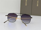 Black square sunglasses with gold arms and gradient lenses on a white background