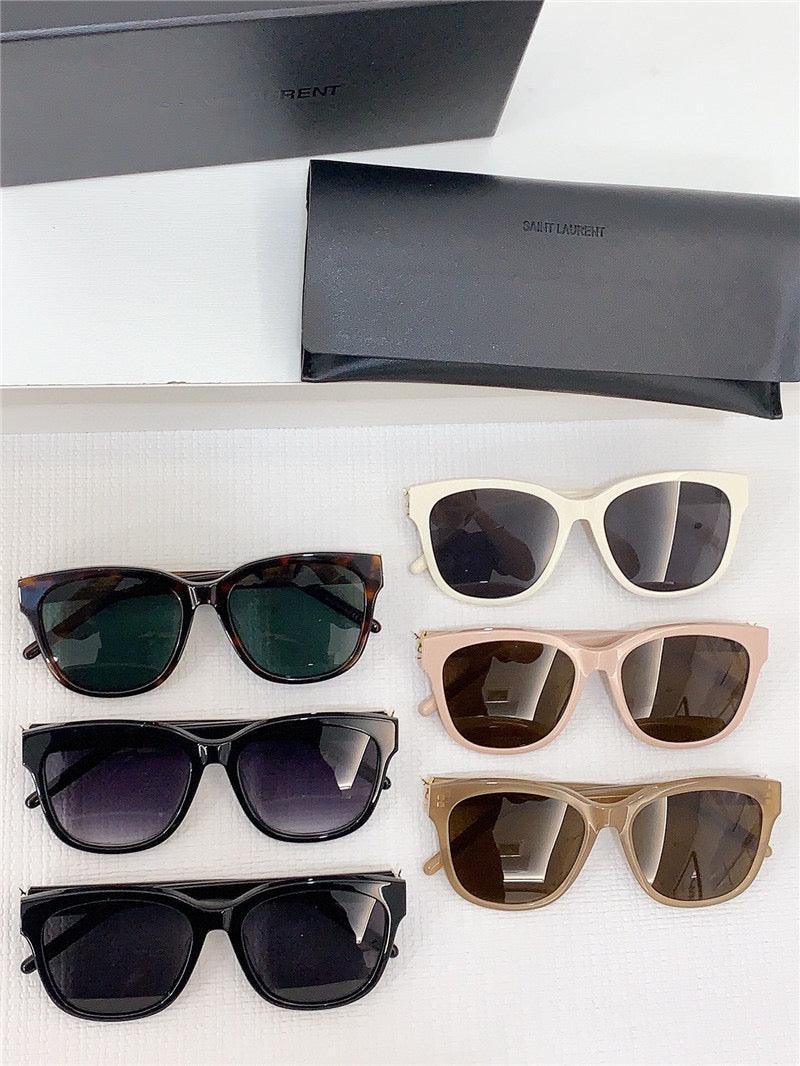 Assorted premium sunglasses with square frames in various colors, displayed with cases.