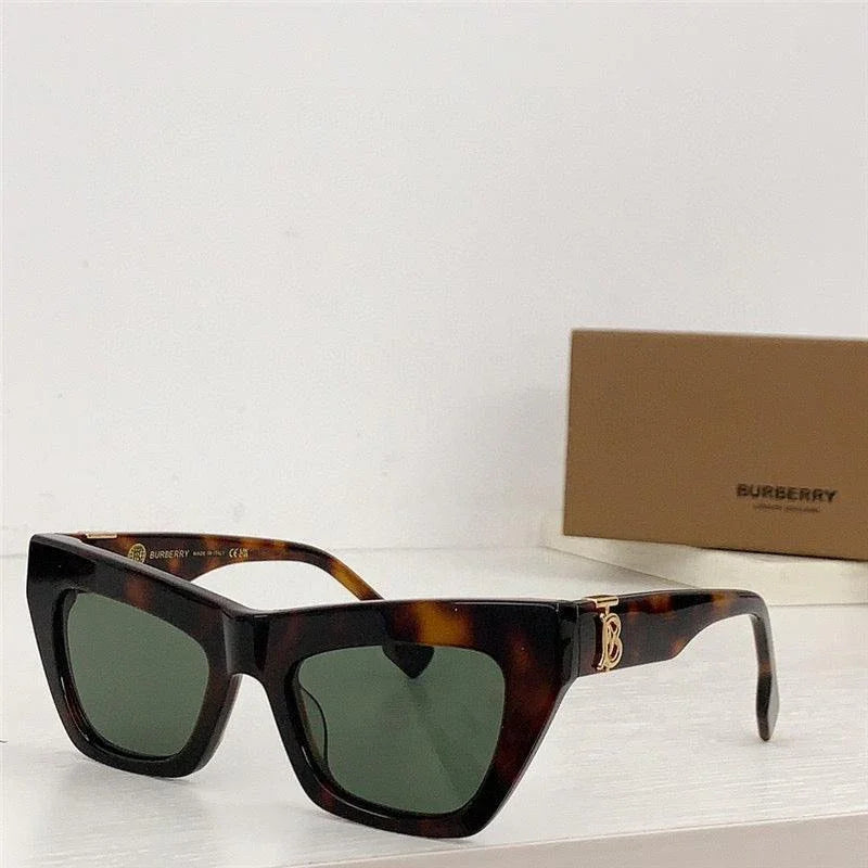 Tortoiseshell square sunglasses with green lenses and gold detail, designer eyewear
