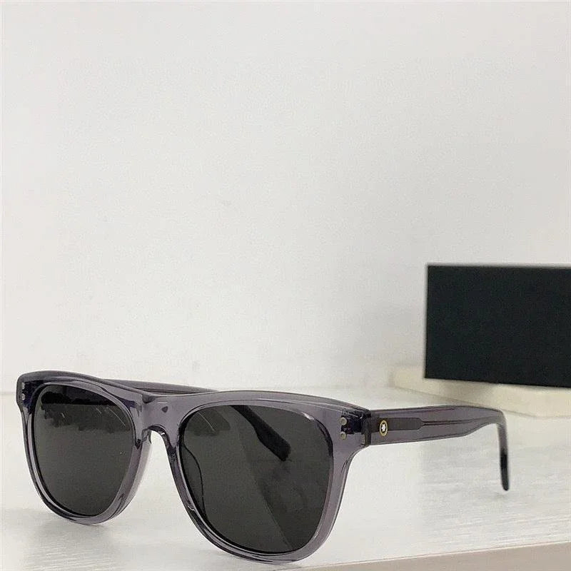 Trendy black polarized sunglasses with transparent frames on a white surface