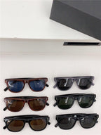 Assorted fashionable sunglasses with square frames and tinted lenses displayed on a white surface.