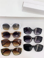 Assorted oversized sunglasses with gradient and dark lenses in stylish frames, displayed on white