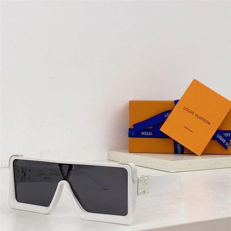 White oversized square sunglasses with black lenses, luxury packaging in background