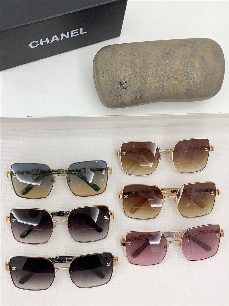 Assorted large square-frame sunglasses with gradient lenses and gold accents, luxury style