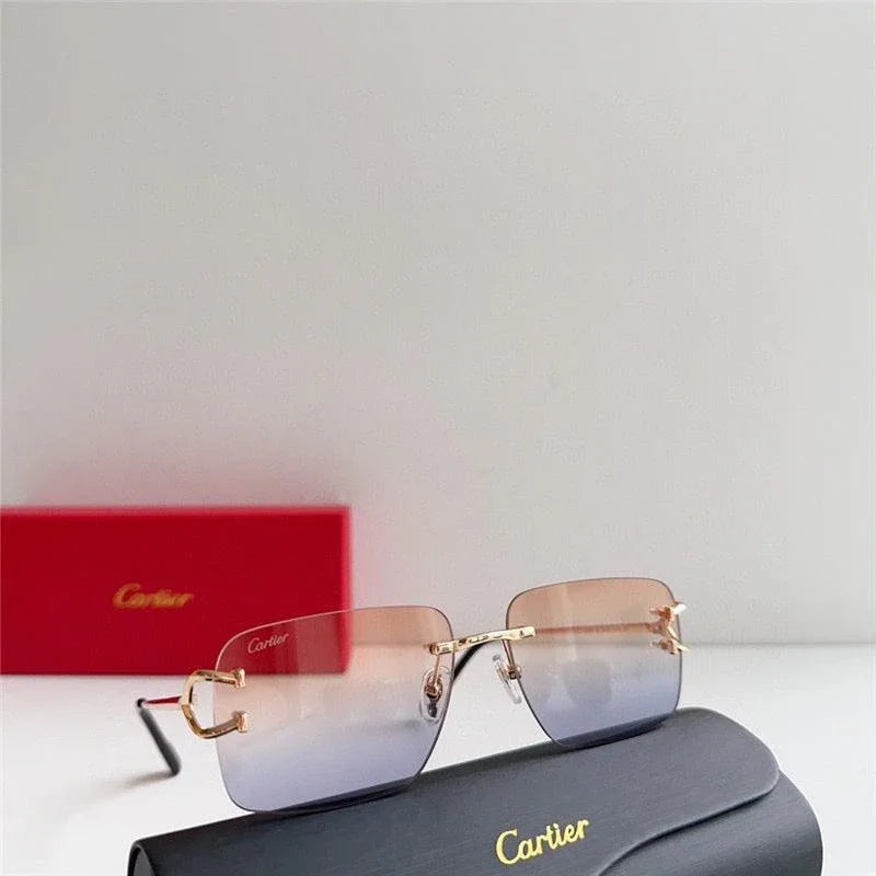 Luxury Cartier rimless sunglasses with gold accents, gradient lenses, and protective case