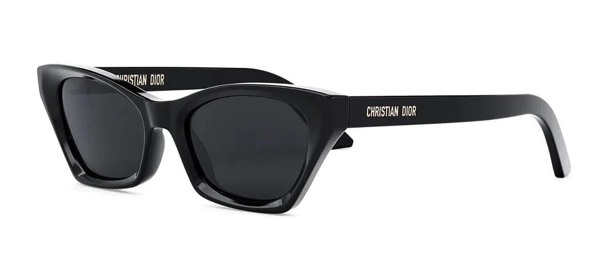 Black cat-eye sunglasses with dark lenses and bold frame, featuring Christian Dior logo on the arms.