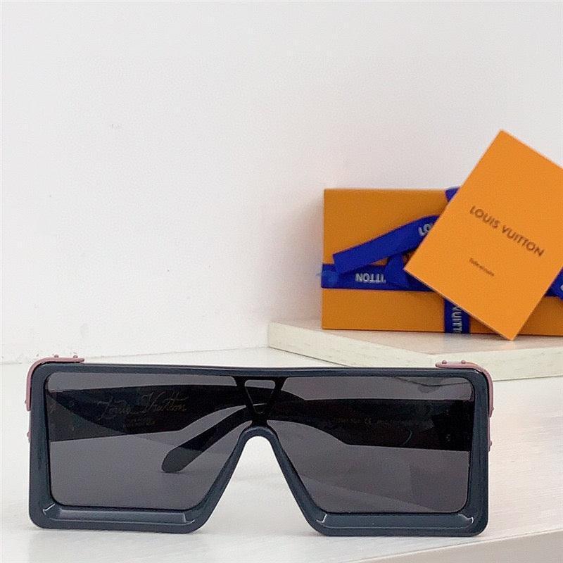 Oversized square sunglasses with black frames and dark lenses on a white surface