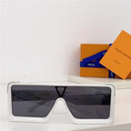 Rectangular oversized sunglasses with white frame and dark lenses, boxed accessory behind.