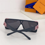 Black rectangular sunglasses with pink accents and dark lenses on white surface