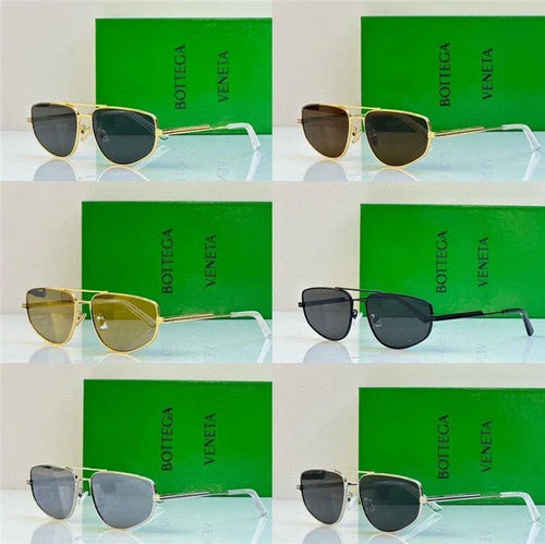 Assorted aviator sunglasses with gold and black frames in front of green boxes, luxury style.