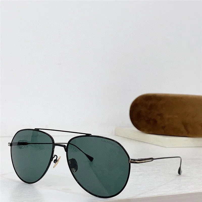 Aviator sunglasses with dark green polarized lenses and black metal frame on white surface