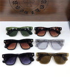 Assorted premium sunglasses with UV400 protection in various frame and lens colors on display